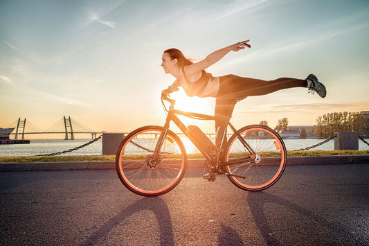 Girl on e-bike in the sun - Pedal & Ride