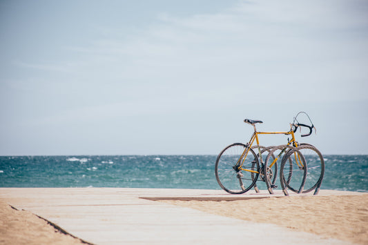 Bike locked to a bike rack on the beach