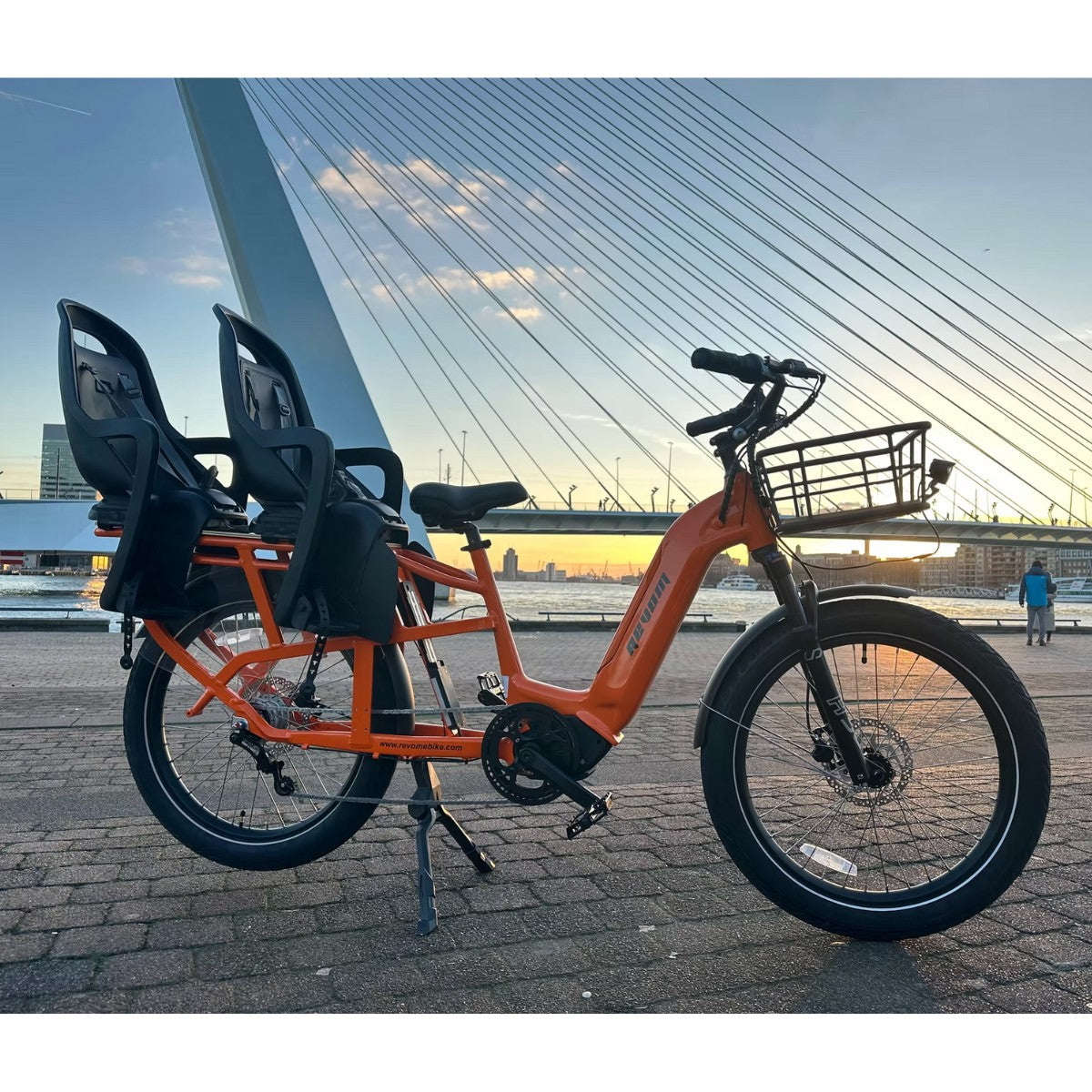 Revom C2 Cargo Electric Bike Orange With Seats In Urban Area - PEDAL & RIDE