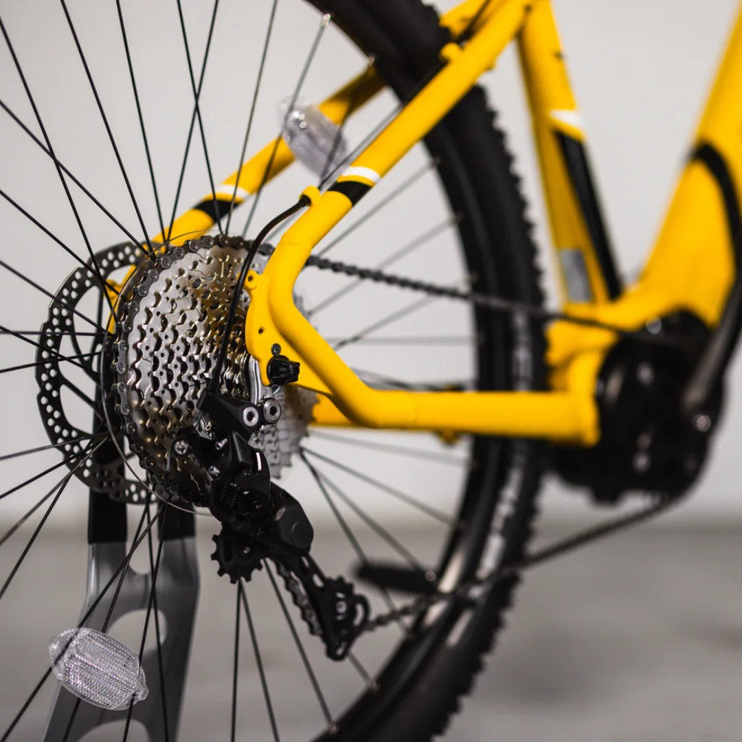 Mark2 Scrambler XC electric mountain bike side view with mullet wheels and alloy frame - PEDAL & RIDE