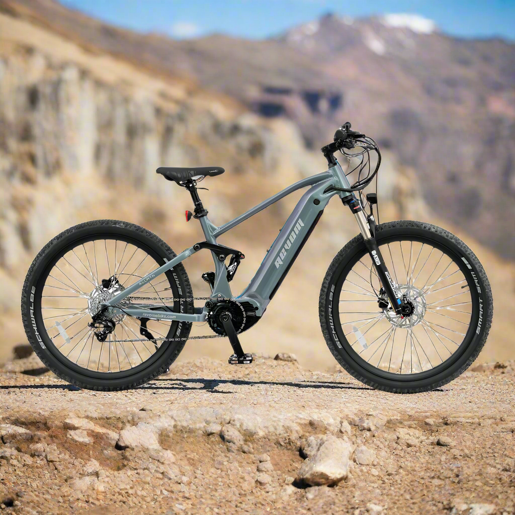 Revom M1 Full Suspension MTB Electric Bike on Mountain - PEDAL & RIDE