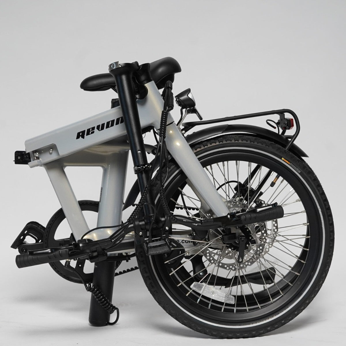 Revom Magi Pro Folding Electric Bike Pearlescent White Left Folded - PEDAL & RIDE