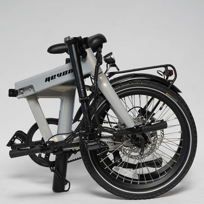 Revom Magi Pro Folding Electric Bike Pearlescent White Left Folded - PEDAL & RIDE