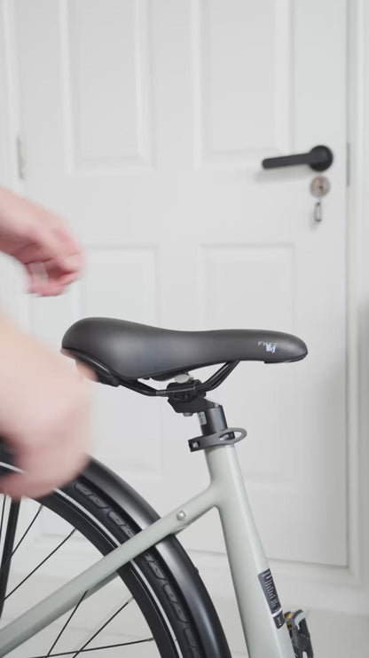 Hygge Nivo Hybrid Step-Through Electric Bike Seat Adjustment - PEDAL & RIDE